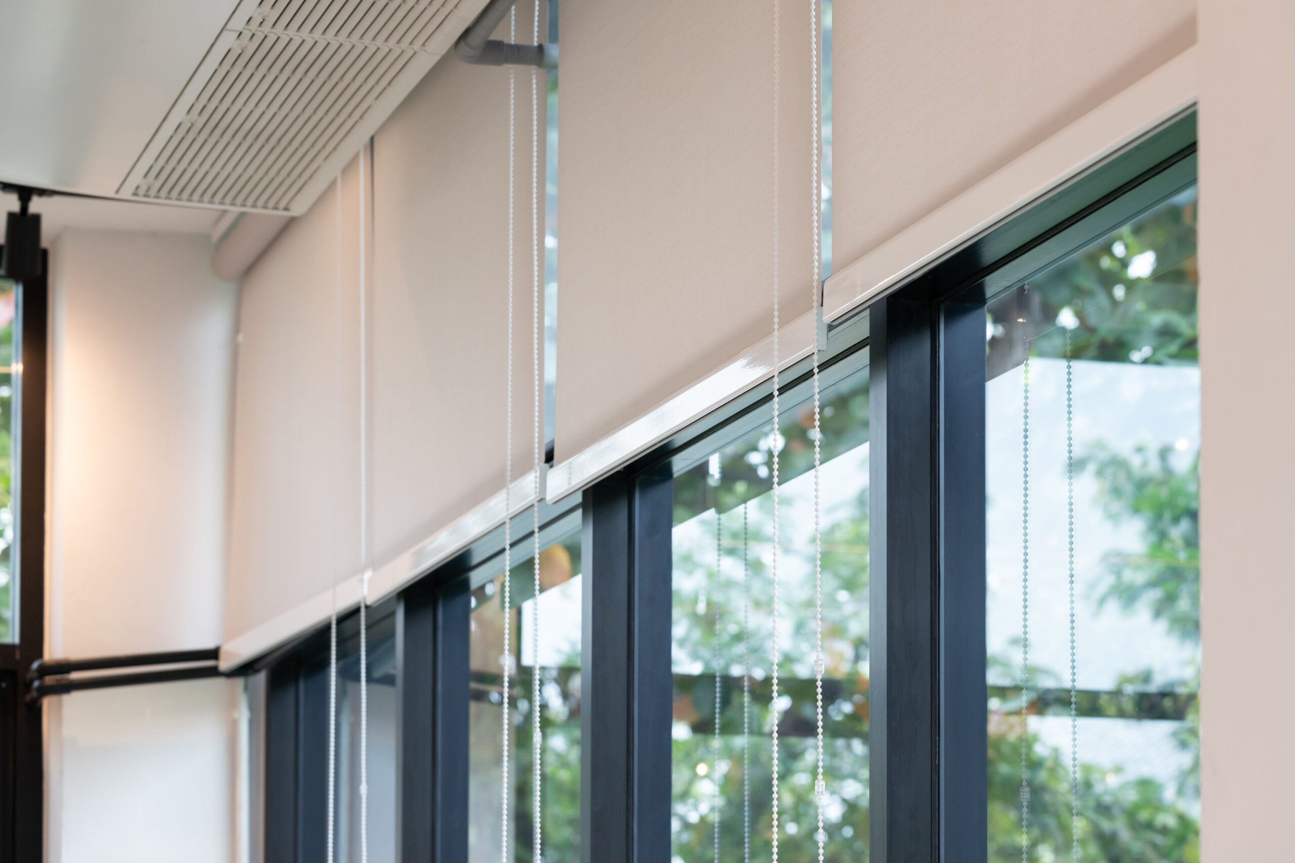 white curtain or white blinds Roller sun protection in office wi